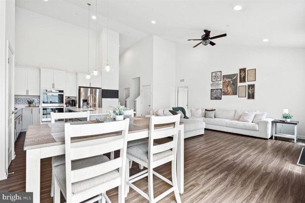 Dining room, Interior, Kitchen, Living room, Pendant Lights, Recessed Lighting, Stainless Steel Appliances, Wood Texture Flooring