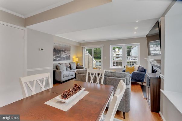 Dining room, Fireplace, Interior, Living room, Recessed Lighting, Wood Texture Flooring