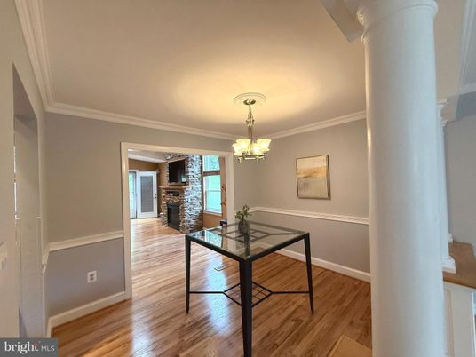 Chandelier, Dining room, Fireplace, Interior, Wood Texture Flooring