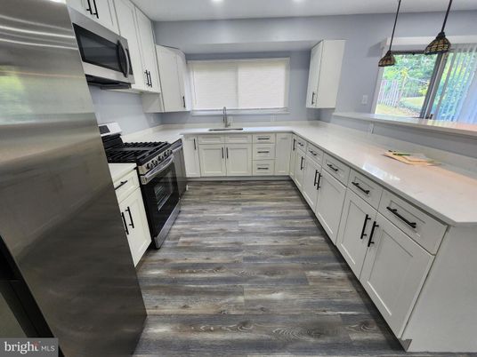 Interior, Kitchen, Pendant Lights, Recessed Lighting, Stainless Steel Appliances, Wood Texture Flooring