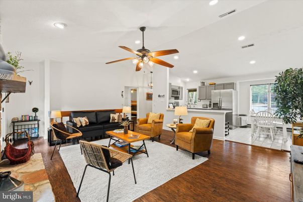 Dining room, Interior, Kitchen, Living room, Recessed Lighting, Stainless Steel Appliances, Wood Texture Flooring