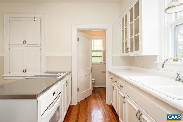 Interior, Kitchen, Pendant Lights, Tile Countertops, Wood Texture Flooring