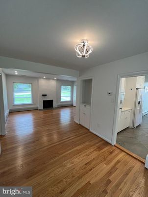 Empty room, Fireplace, Interior, Recessed Lighting, Wood Texture Flooring