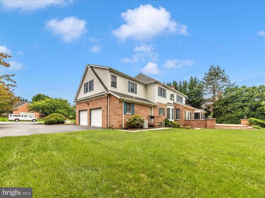 Attached, Backyard, Exterior, Facade, Brick Facade, Tudor Revival