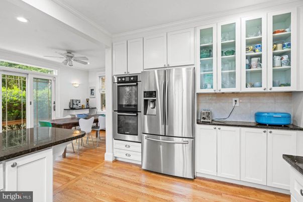 Dining room, Interior, Kitchen, Recessed Lighting, Stainless Steel Appliances, Wood Texture Flooring