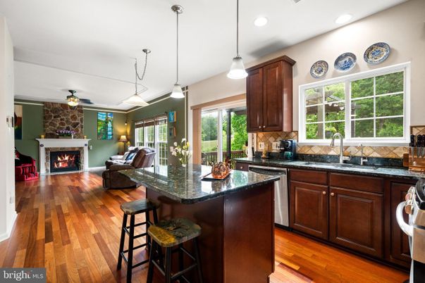 Fireplace, Interior, Kitchen, Pendant Lights, Recessed Lighting, Stone Walls, Wood Texture Flooring