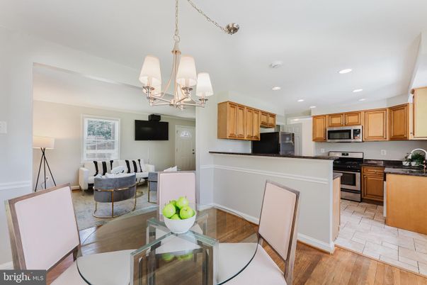 Chandelier, Dining room, Interior, Kitchen, Living room, Recessed Lighting, Stainless Steel Appliances, Wood Texture Flooring