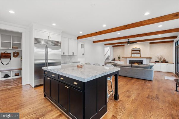 Fireplace, Interior, Kitchen, Living room, Recessed Lighting, Stainless Steel Appliances, Wooden Beams, Wood Texture Flooring