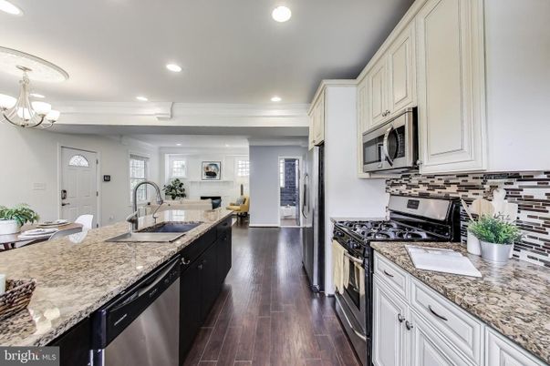 Chandelier, Interior, Kitchen, Recessed Lighting, Stainless Steel Appliances, Wood Texture Flooring
