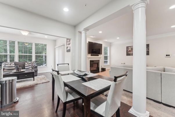 Dining room, Fireplace, Interior, Living room, Recessed Lighting, Wood Texture Flooring