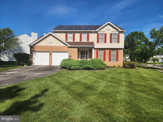 Attached, Exterior, Facade, Brick Facade, Solar Panels, Split Level