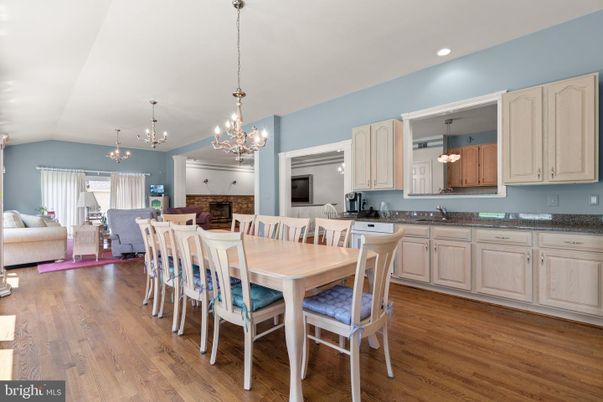 Chandelier, Dining room, Fireplace, Interior, Kitchen, Living room, Pendant Lights, Recessed Lighting, Wood Texture Flooring