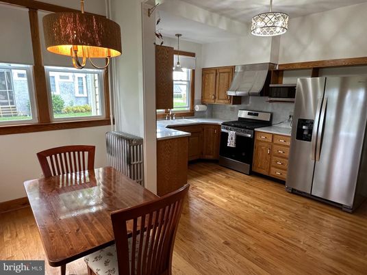 Dining room, Interior, Kitchen, Pendant Lights, Stainless Steel Appliances, Wood Texture Flooring