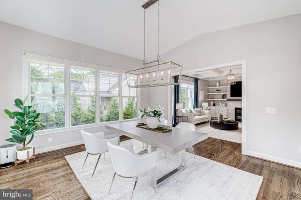 Chandelier, Dining room, Fireplace, Interior, Living room, Pendant Lights, Wood Texture Flooring