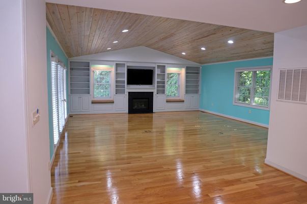 Empty room, Fireplace, Interior, Recessed Lighting, Wooden Ceilings, Wood Texture Flooring