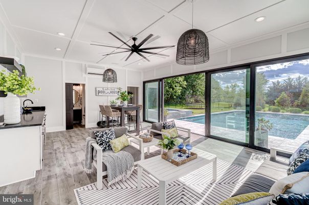 Dining room, Interior, Living room, Pendant Lights, Recessed Lighting, Sun Room, Water, Wood Texture Flooring
