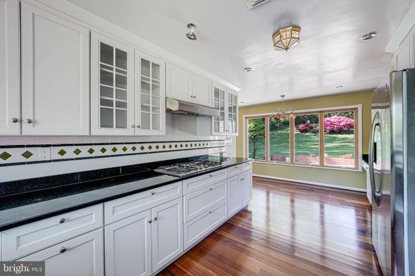 Chandelier, Interior, Kitchen, Recessed Lighting, Stainless Steel Appliances, Wood Texture Flooring