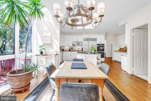 Chandelier, Dining room, Interior, Kitchen, Stainless Steel Appliances, Wood Texture Flooring