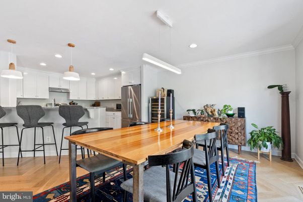 Dining room, Interior, Kitchen, Pendant Lights, Recessed Lighting, Stainless Steel Appliances, Wood Texture Flooring