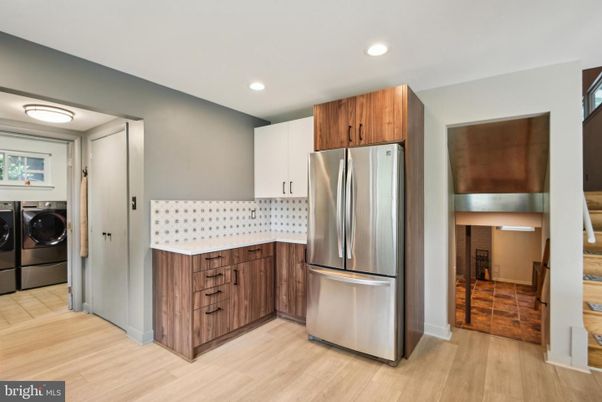 Interior, Kitchen, Recessed Lighting, Stainless Steel Appliances, Utility Closets, Washer, Wood Texture Flooring