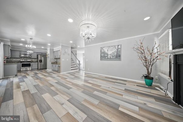 Chandelier, Interior, Kitchen, Recessed Lighting, Stainless Steel Appliances, Wood Texture Flooring