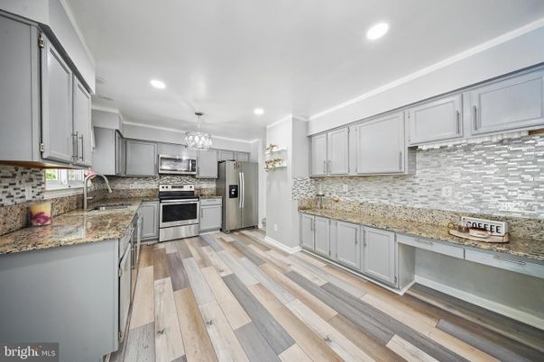 Chandelier, Interior, Kitchen, Recessed Lighting, Stainless Steel Appliances, Wood Texture Flooring