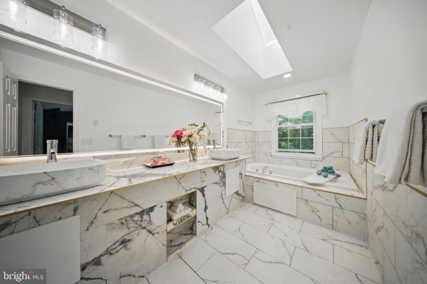 Bathroom, Dual Sink Vanities, Interior, Marble, Marble Walls, Recessed Lighting