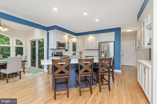Dining room, Interior, Kitchen, Recessed Lighting, Stainless Steel Appliances, Wood Texture Flooring