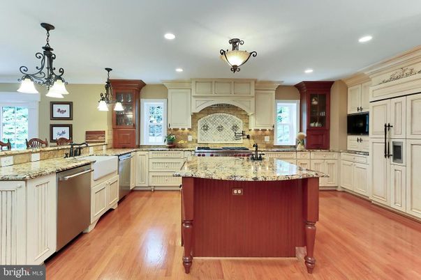 Chandelier, Interior, Kitchen, Pendant Lights, Recessed Lighting, Stainless Steel Appliances, Wood Texture Flooring
