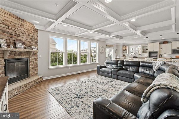 Fireplace, Interior, Kitchen, Living room, Pendant Lights, Recessed Lighting, Stone Walls, Wood Texture Flooring