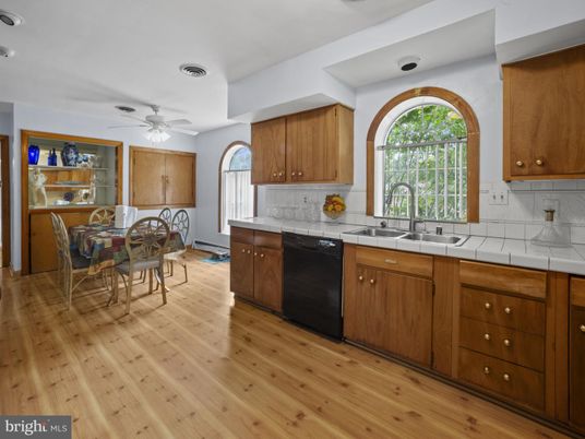 Dining room, Interior, Kitchen, Recessed Lighting, Tile Countertops, Wood Texture Flooring