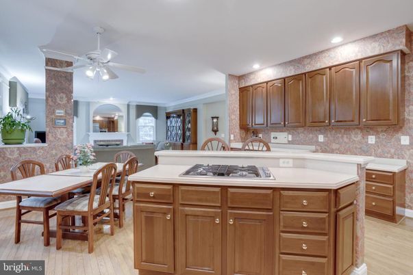 Dining room, Fireplace, Interior, Kitchen, Recessed Lighting, Wood Texture Flooring
