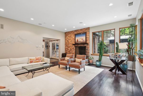 Fireplace, Interior, Living room, Recessed Lighting, Stone Walls, Wood Texture Flooring