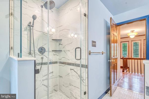 Bathroom, Glass Shower, Interior, Marble Walls, Wood Texture Flooring