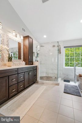 Bathroom, Dual Sink Vanities, Glass Shower, Interior, Marble Walls, Recessed Lighting