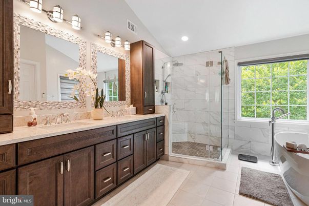 Bathroom, Dual Sink Vanities, Glass Shower, Interior, Marble Walls, Recessed Lighting