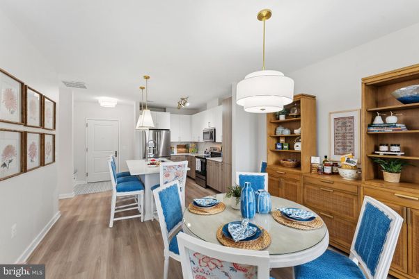 Dining room, Interior, Kitchen, Pendant Lights, Stainless Steel Appliances, Wood Texture Flooring