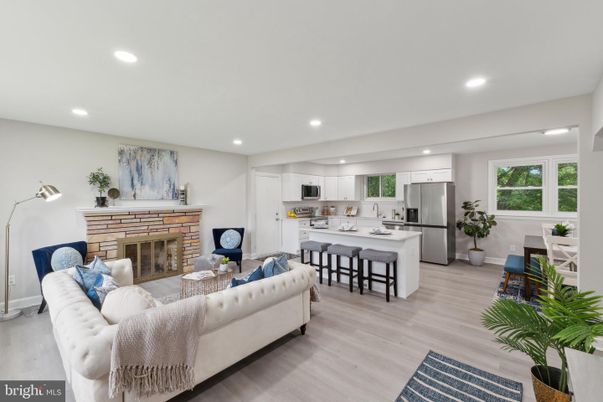 Fireplace, Interior, Kitchen, Living room, Recessed Lighting, Stainless Steel Appliances, Wood Texture Flooring