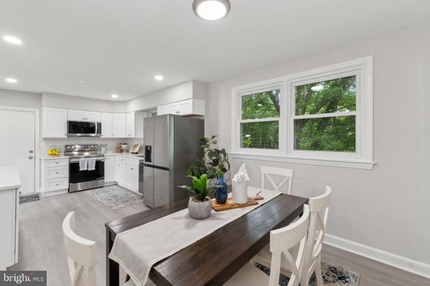 Dining room, Interior, Kitchen, Recessed Lighting, Stainless Steel Appliances, Wood Texture Flooring