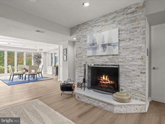 Dining room, Fireplace, Interior, Recessed Lighting, Stone Walls, Wood Texture Flooring