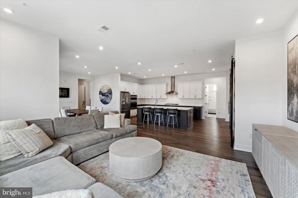Dining room, Interior, Kitchen, Living room, Recessed Lighting, Stainless Steel Appliances, Wood Texture Flooring