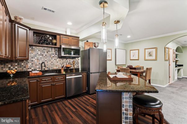 Dining room, Interior, Kitchen, Pendant Lights, Recessed Lighting, Stainless Steel Appliances, Wood Texture Flooring