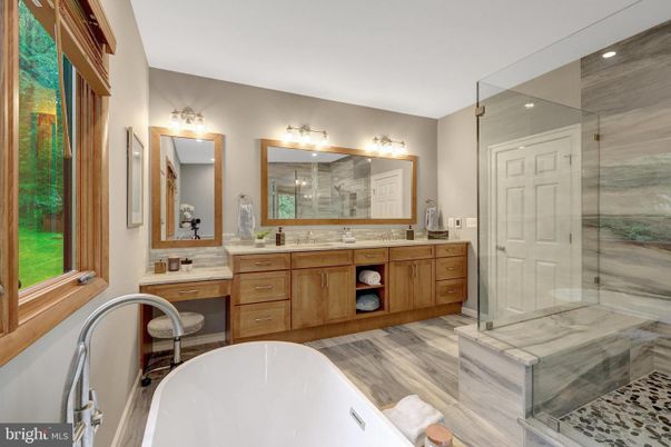 Bathroom, Dual Sink Vanities, Free Standing Baths, Glass Shower, Interior, Wood Texture Flooring