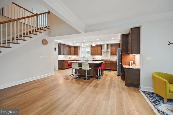Dining room, Interior, Kitchen, Pendant Lights, Recessed Lighting, Stainless Steel Appliances, Wood Texture Flooring