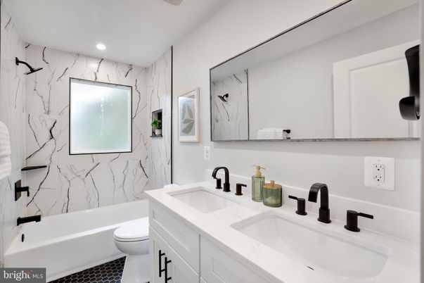 Bathroom, Dual Sink Vanities, Interior, Marble Walls, Recessed Lighting