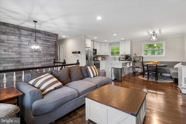 Dining room, Interior, Kitchen, Living room, Pendant Lights, Recessed Lighting, Stainless Steel Appliances, Wood Texture Flooring