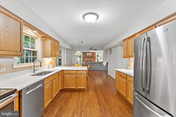 Interior, Kitchen, Stainless Steel Appliances, Stone Walls, Wood Texture Flooring