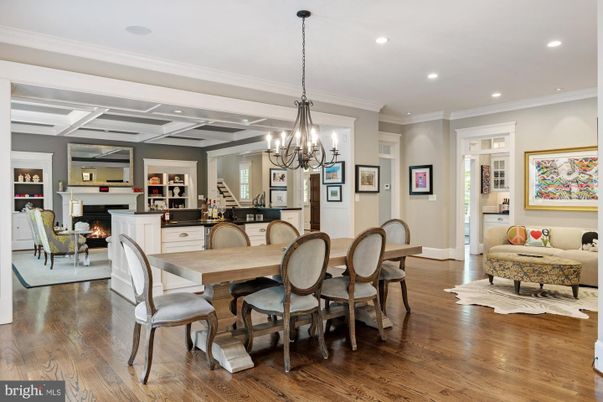 Chandelier, Dining room, Fireplace, Interior, Living room, Recessed Lighting, Wood Texture Flooring