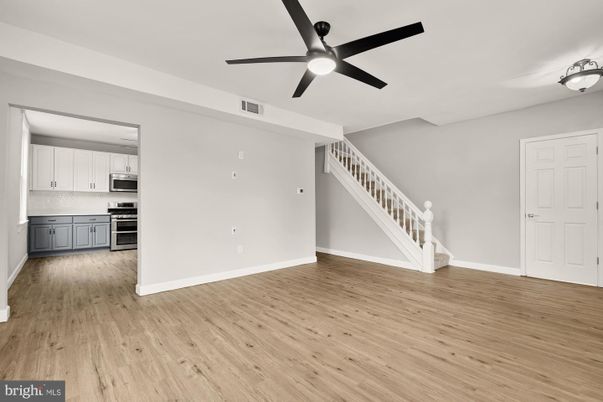Empty room, Interior, Kitchen, Stainless Steel Appliances, Wood Texture Flooring