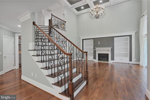 Chandelier, Fireplace, Interior, Recessed Lighting, Wood Texture Flooring